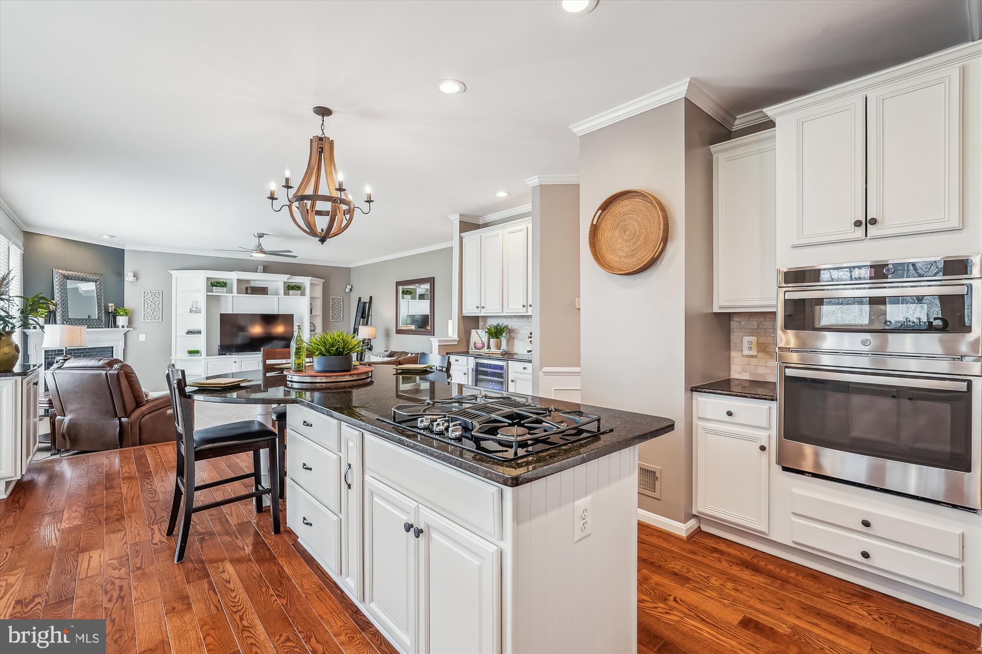 42925 Ellzey Drive Broadlands, VA 20148 - Photo 29 of 96 a kitchen with stainless steel appliances granite countertop a stove and cabinets