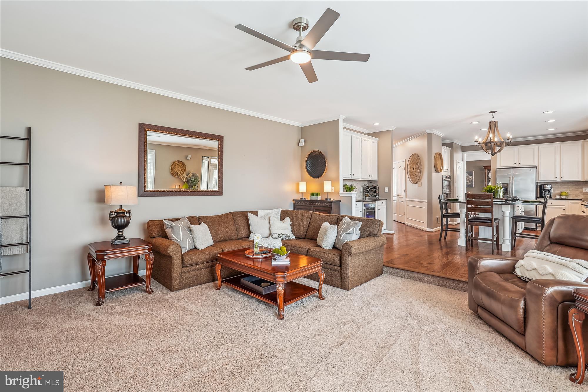 42925 Ellzey Drive Broadlands, VA 20148 - Photo 33 of 96 a living room with furniture and a view of kitchen