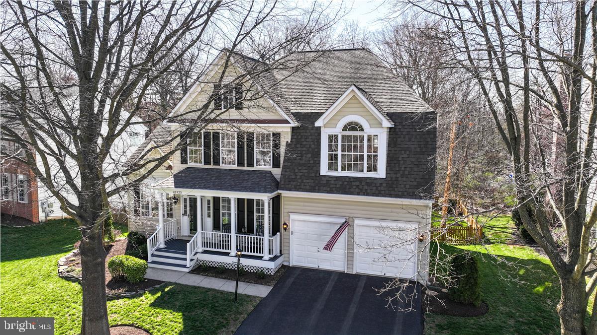42925 Ellzey Drive Broadlands, VA 20148 - Photo 4 of 96 a front view of a house with a yard