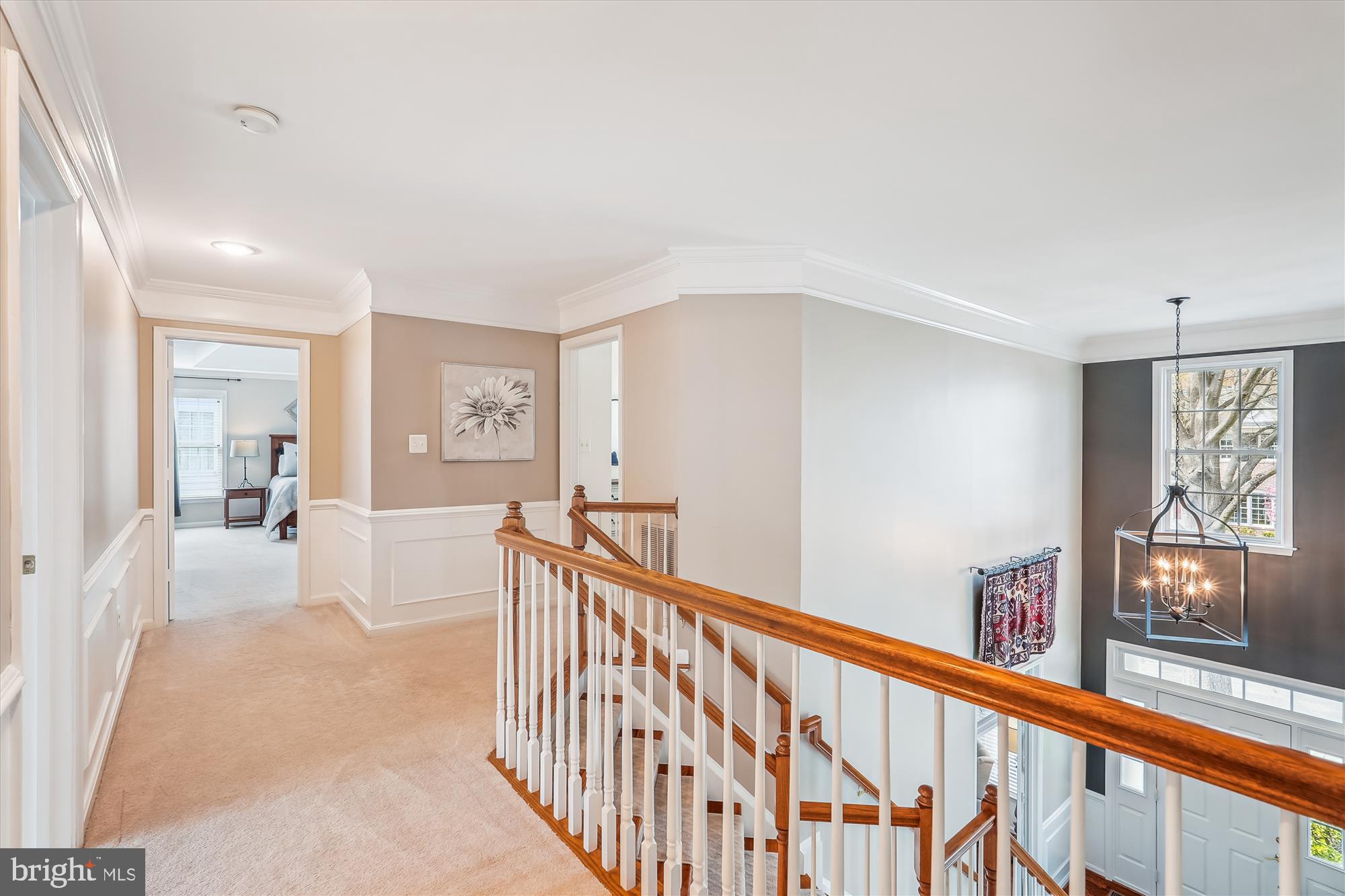 42925 Ellzey Drive Broadlands, VA 20148 - Photo 44 of 96 a view of a hallway with wooden floor and windows