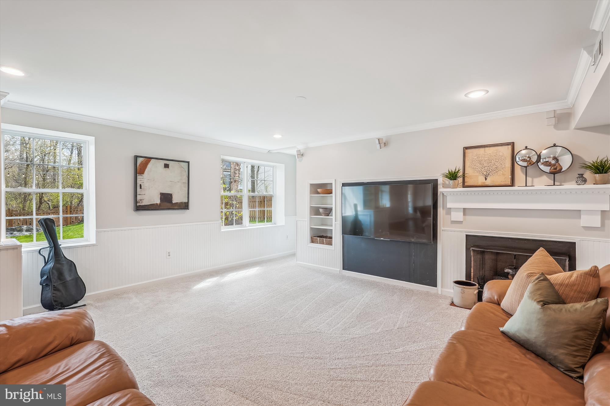 42925 Ellzey Drive Broadlands, VA 20148 - Photo 70 of 96 a living room with furniture and a fireplace