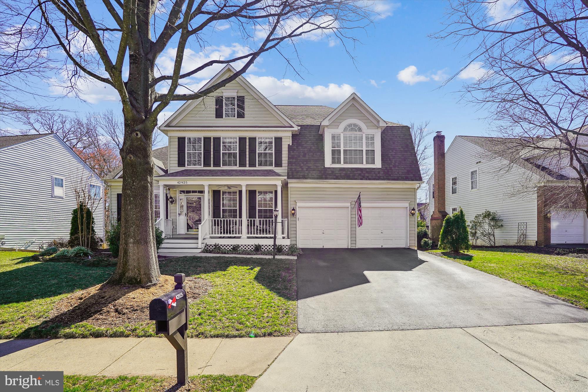 42925 Ellzey Drive Broadlands, VA 20148 - Photo 76 of 96 a front view of a house with garden
