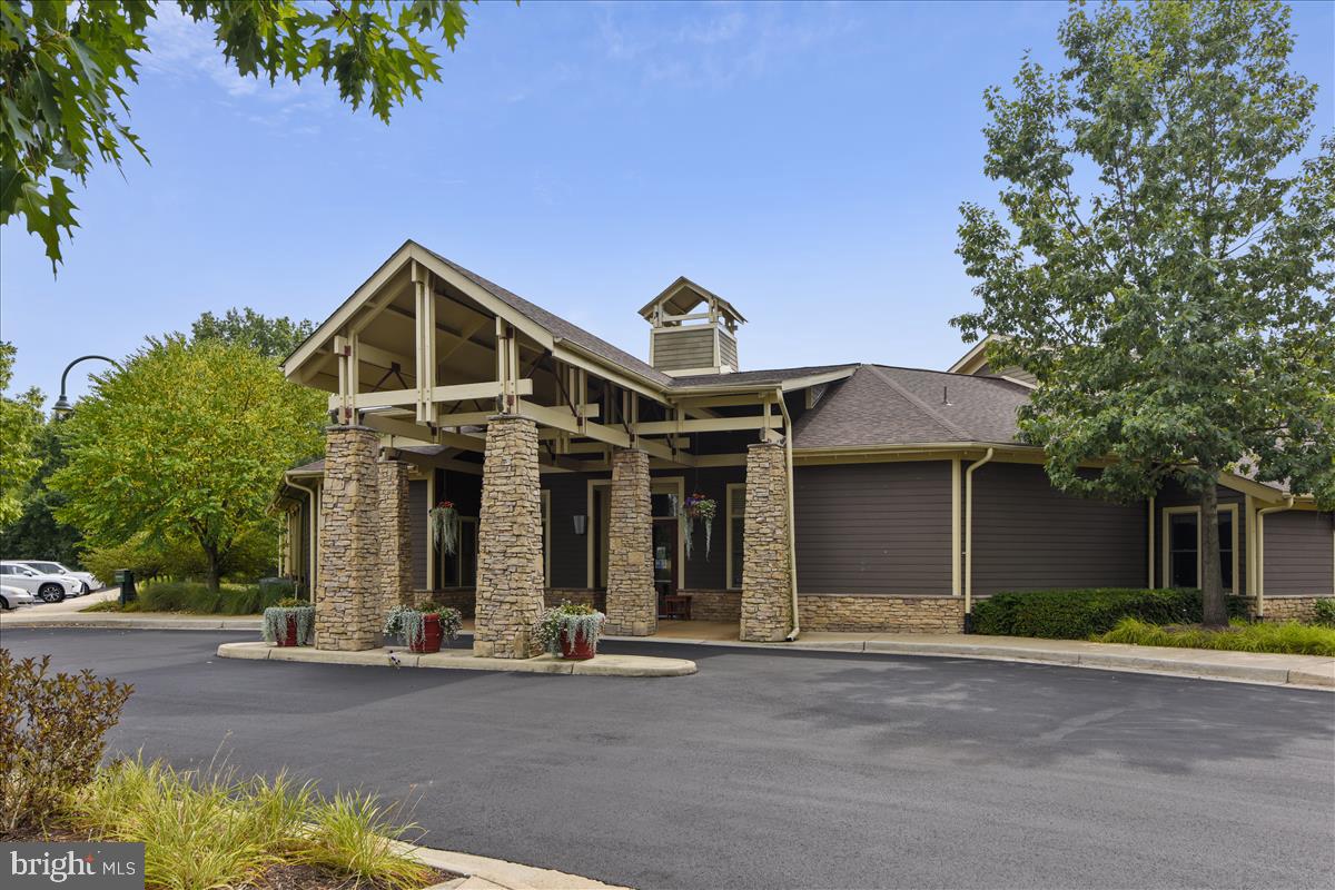 42925 Ellzey Drive Broadlands, VA 20148 - Photo 92 of 96 a front view of a house with a yard