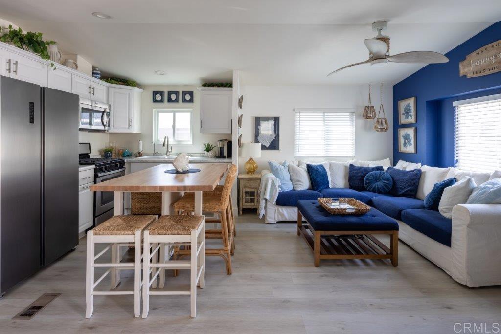 123 Jasper Street Encinitas, CA 92024 - Photo 5 of 15 a view of a dining room with furniture