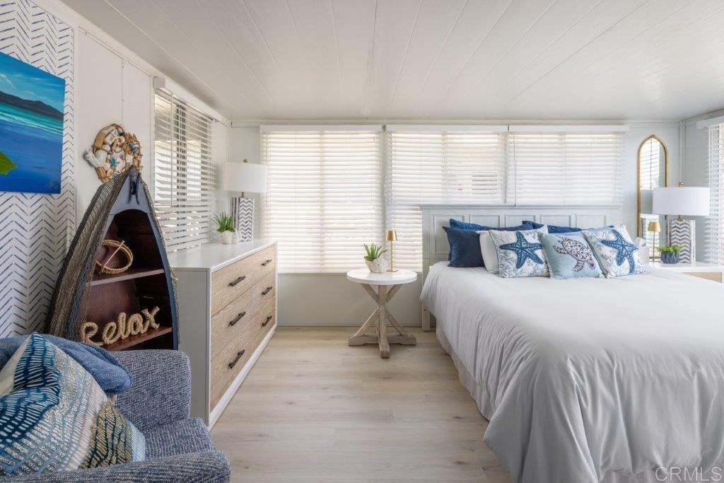 123 Jasper Street Encinitas, CA 92024 - Photo 8 of 15 a bedroom with a bed and a window