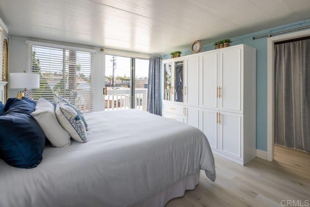 123 Jasper Street Encinitas, CA 92024 - Photo 9 of 15 a bedroom with a bed and a window