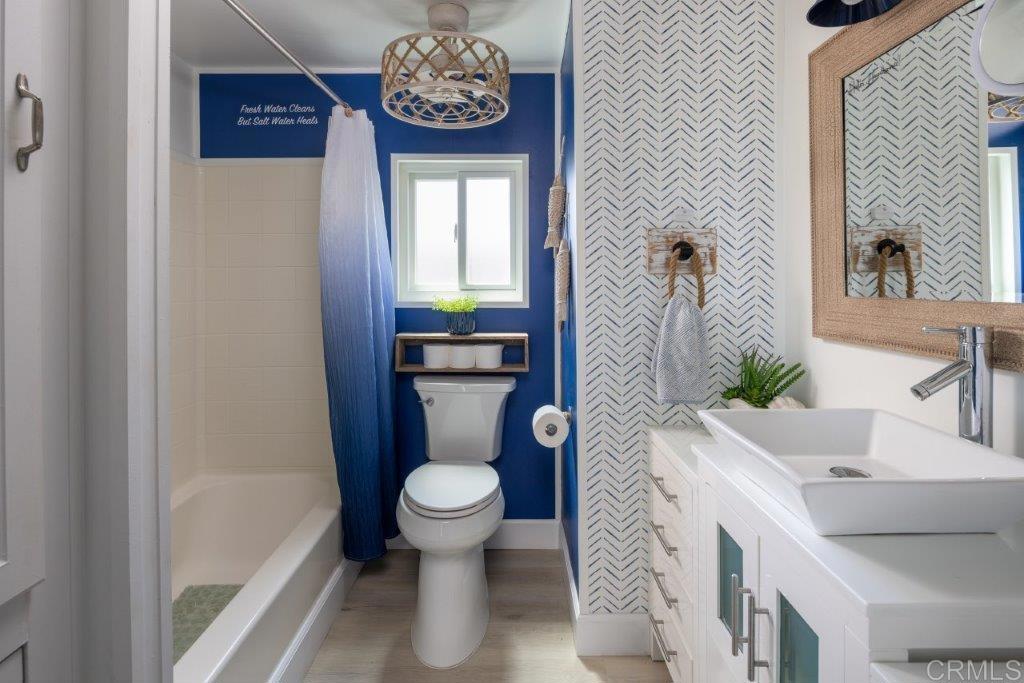 123 Jasper Street Encinitas, CA 92024 - Photo 10 of 15 a bathroom with a toilet and a sink