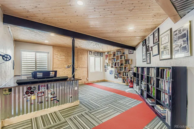 a house view with a sitting space and balcony