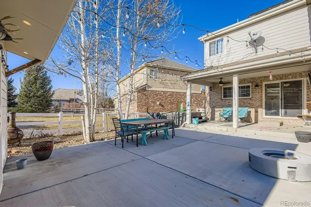 a backyard of a house with seating space