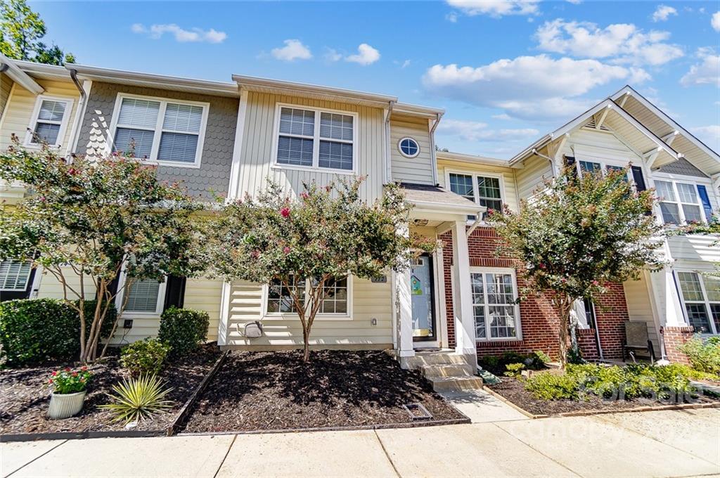 772 Shellstone Place Fort Mill, SC 29708 - Photo 2 of 35 a front view of a house with garden