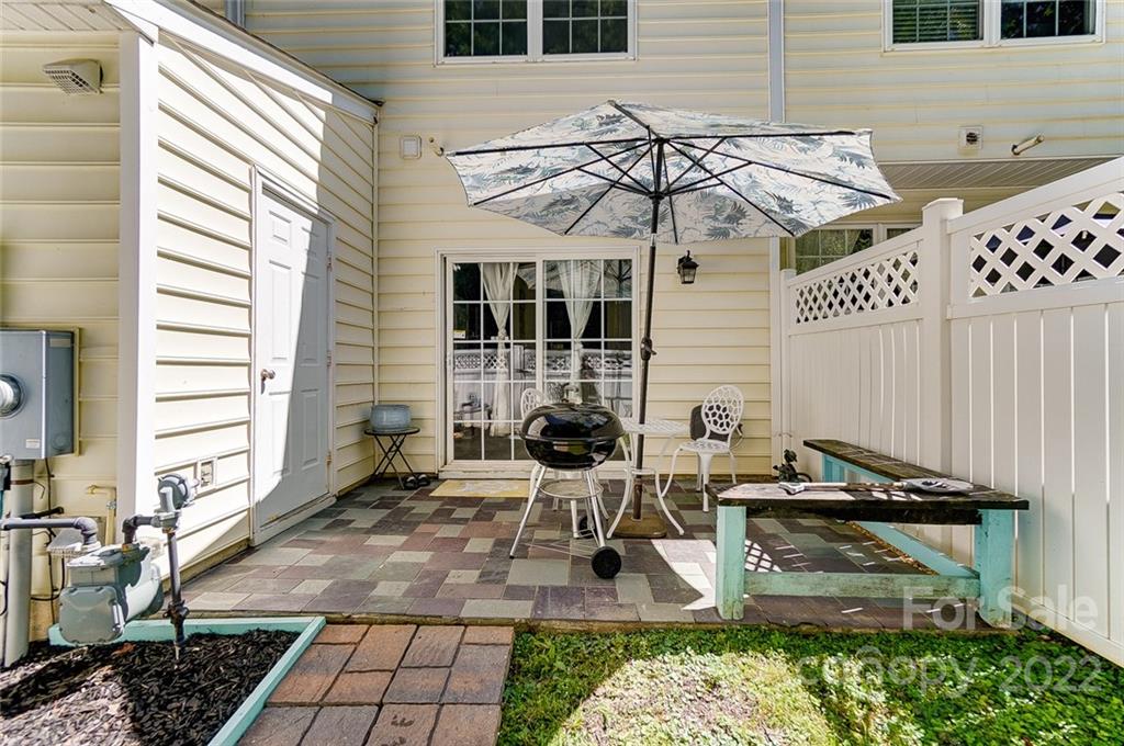 772 Shellstone Place Fort Mill, SC 29708 - Photo 32 of 35 a view of a patio with table and chairs