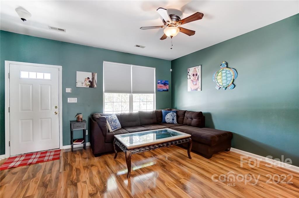 772 Shellstone Place Fort Mill, SC 29708 - Photo 8 of 35 a living room with furniture and a window