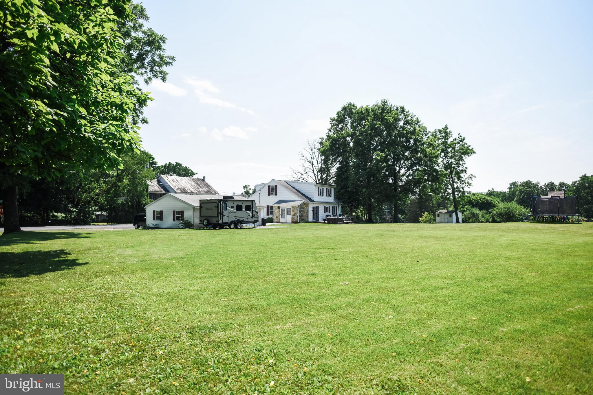 641 Schubert Road Bethel, PA 19507 - Photo 59 of 68 View of house/garages from rear of property
