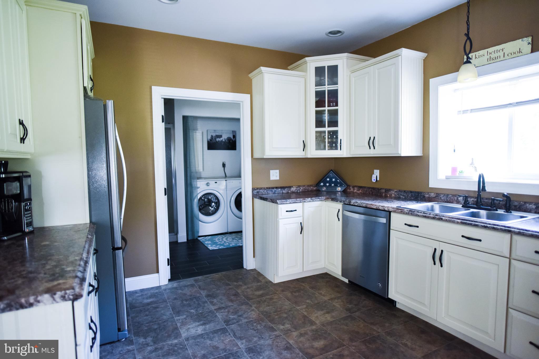 641 Schubert Road Bethel, PA 19507 - Photo 10 of 68 Kitchen toward laundry/bath