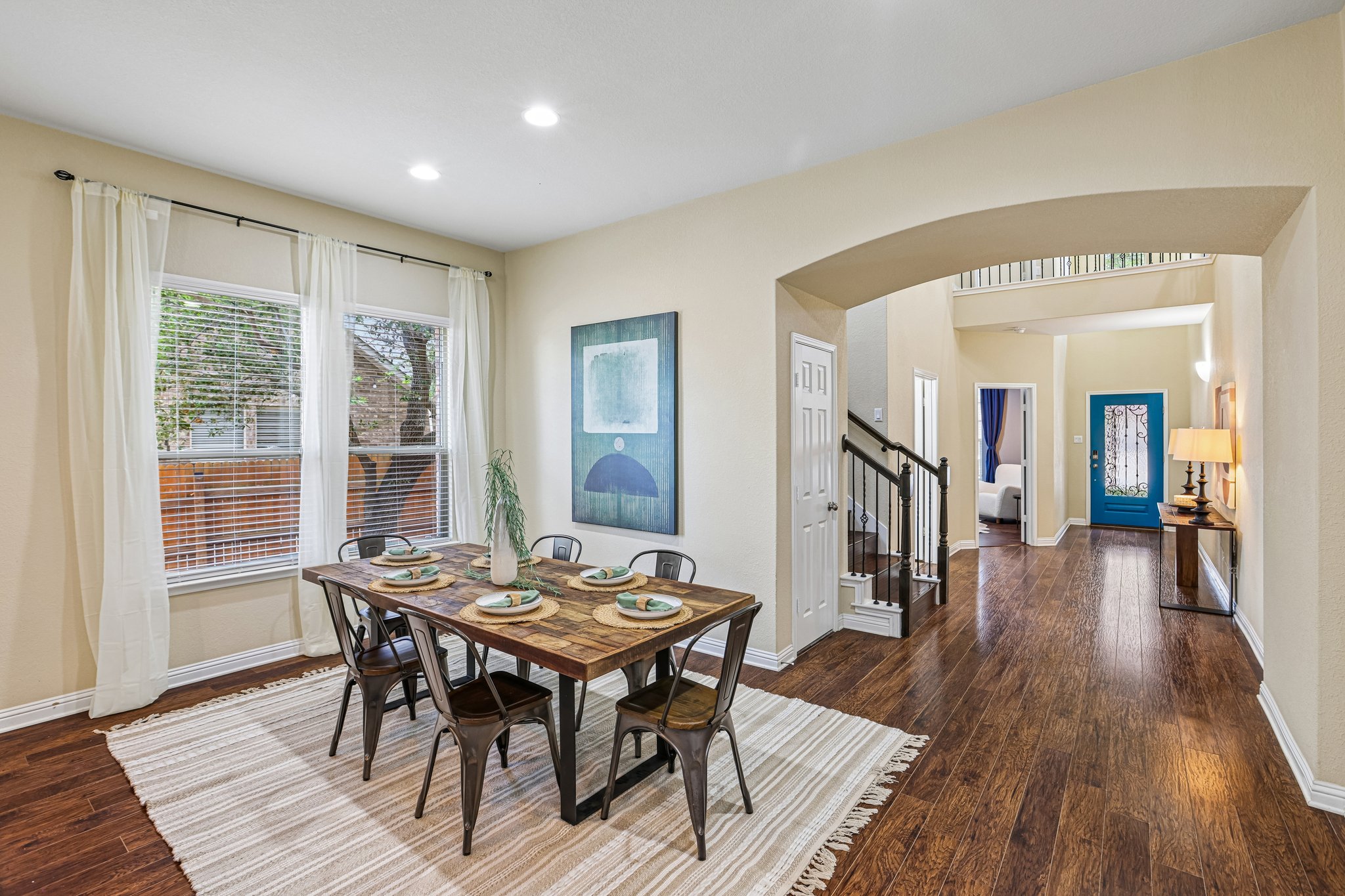 1924 Granite Springs Road Leander, TX 78641 - Photo 9 of 36 Rich hardwood floors lead into this inviting dining area, perfect for entertaining.