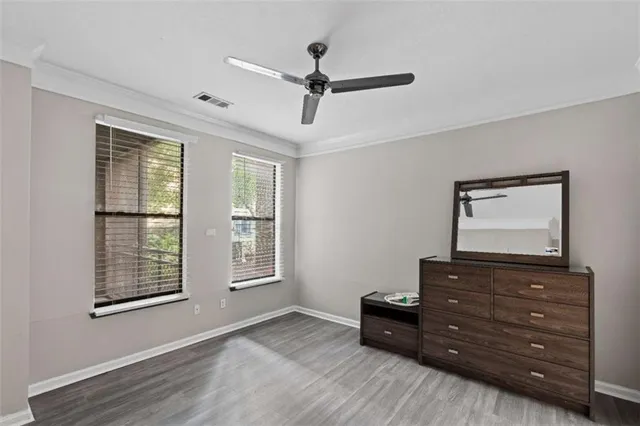 a living room with couch and a window