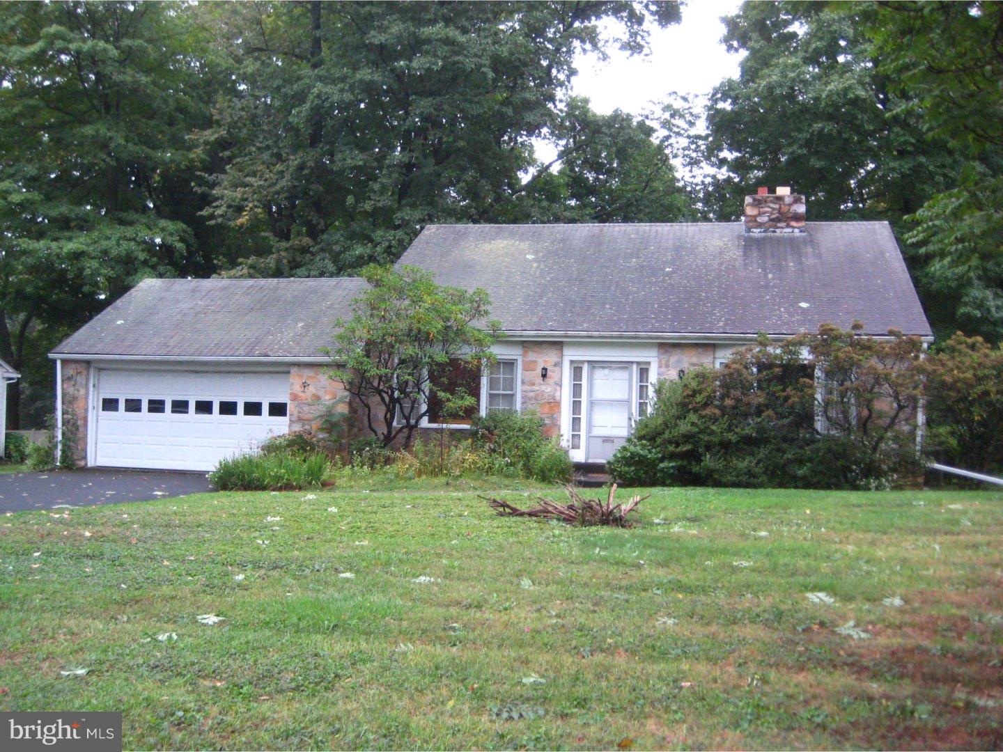 1074 Kipling Road Jenkintown, PA 19046 - Photo 1 of 18 a view of house with garden and a tree