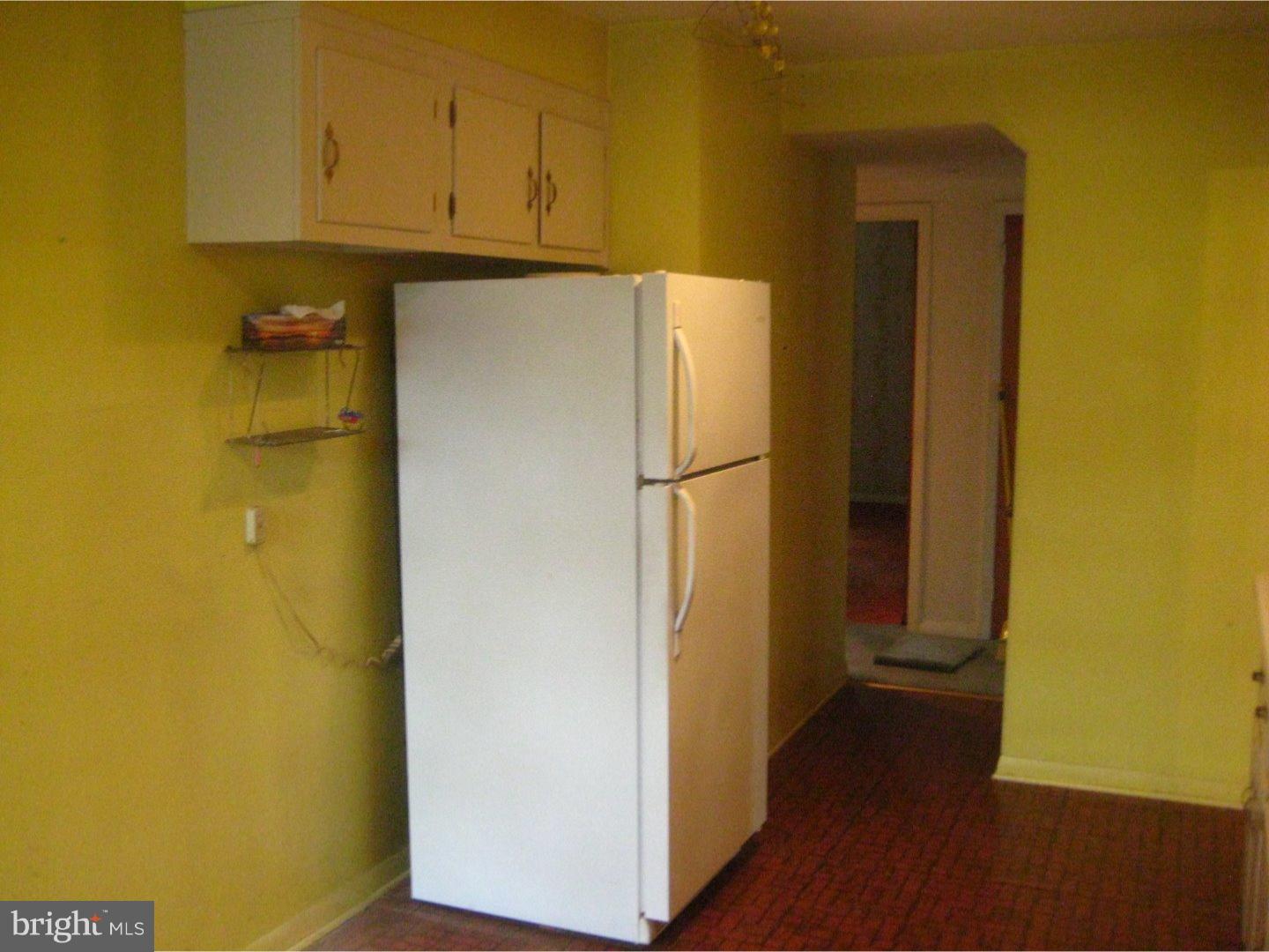 1074 Kipling Road Jenkintown, PA 19046 - Photo 12 of 18 a view of a hallway with wooden floor