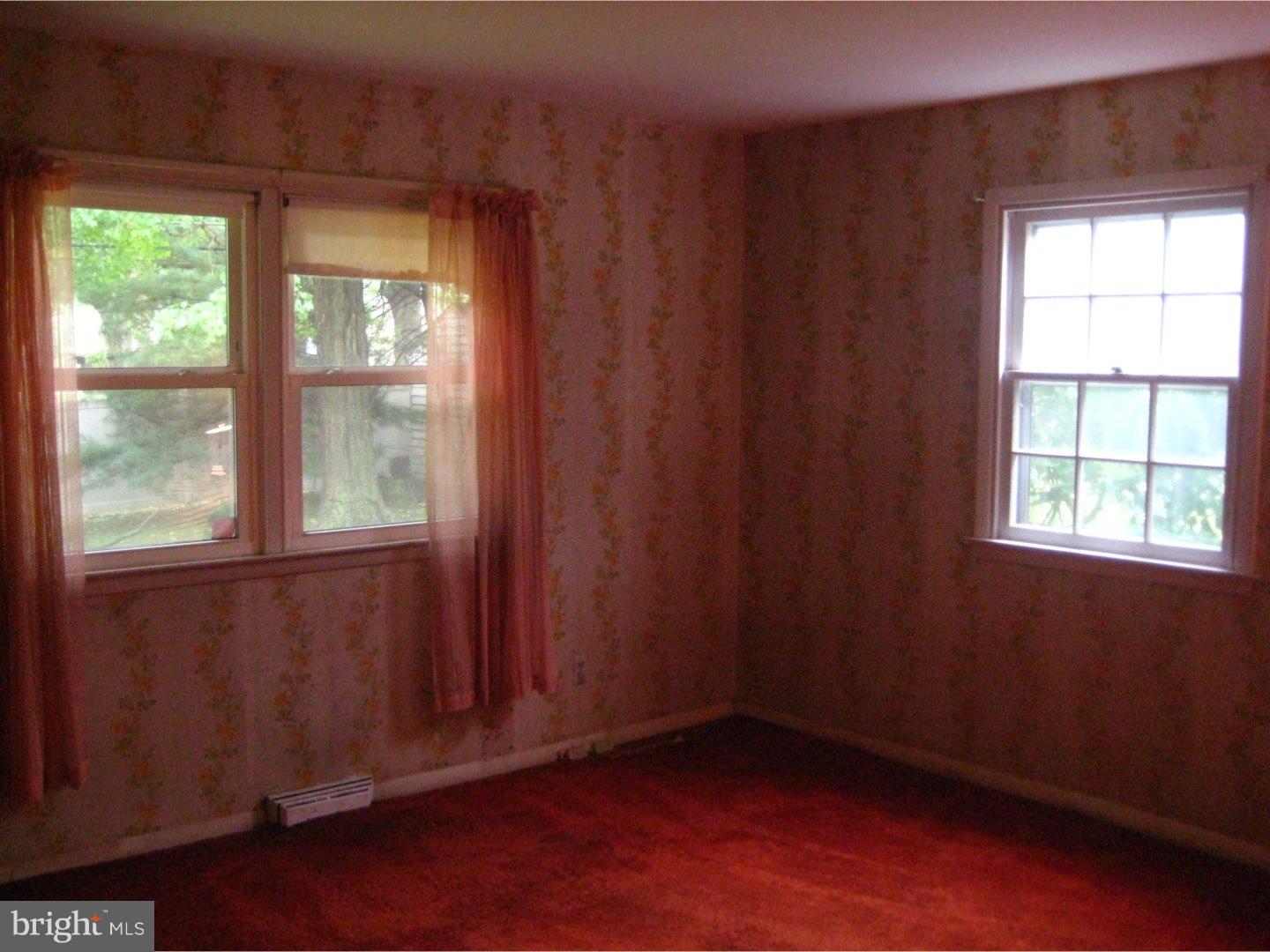 1074 Kipling Road Jenkintown, PA 19046 - Photo 14 of 18 an empty room with a window