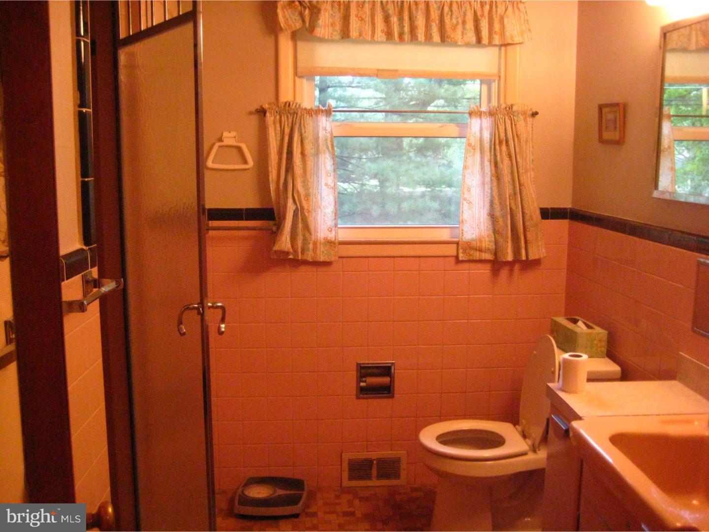 1074 Kipling Road Jenkintown, PA 19046 - Photo 15 of 18 a bathroom with a toilet and a sink
