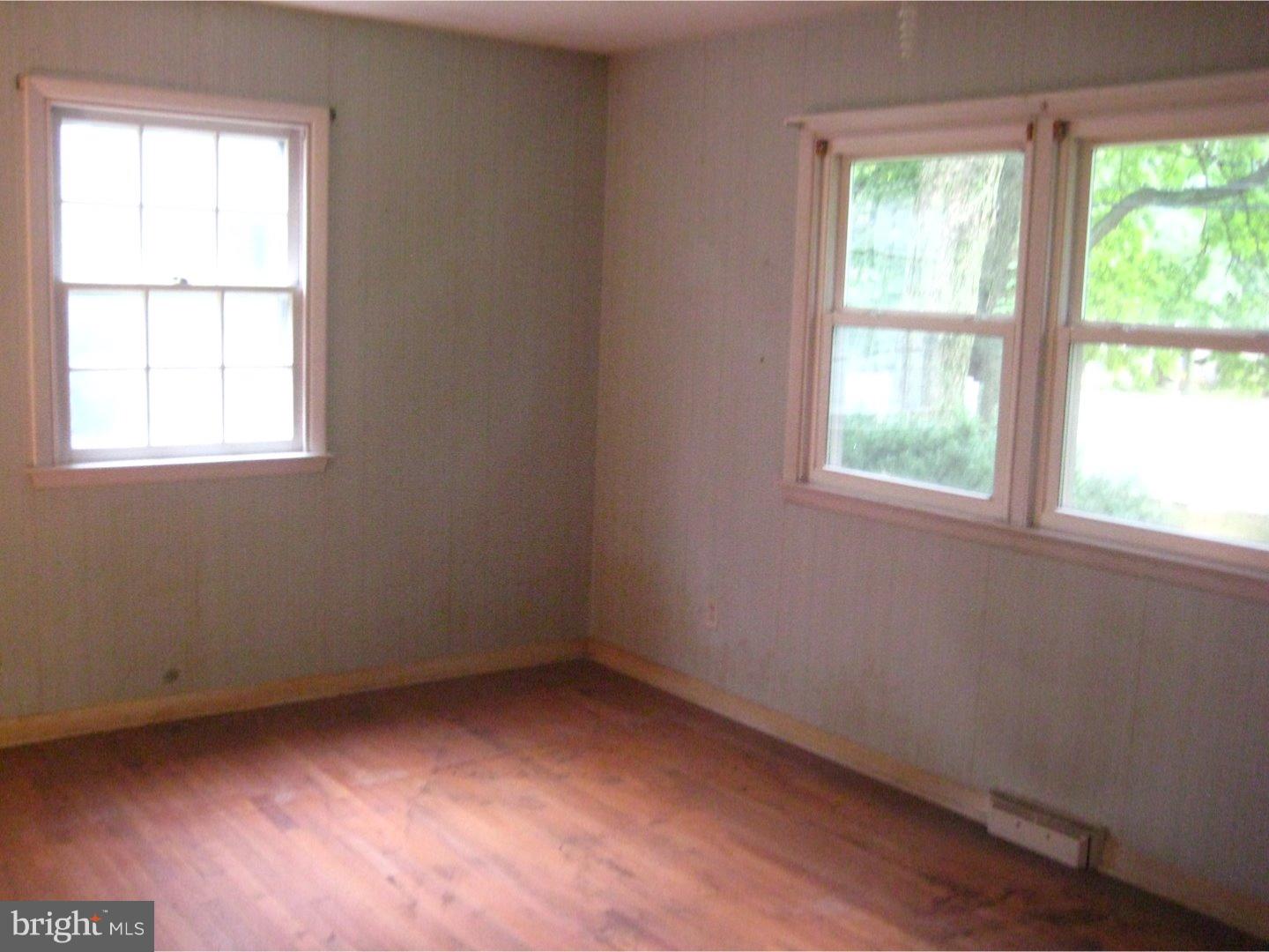 1074 Kipling Road Jenkintown, PA 19046 - Photo 16 of 18 an empty room with a window