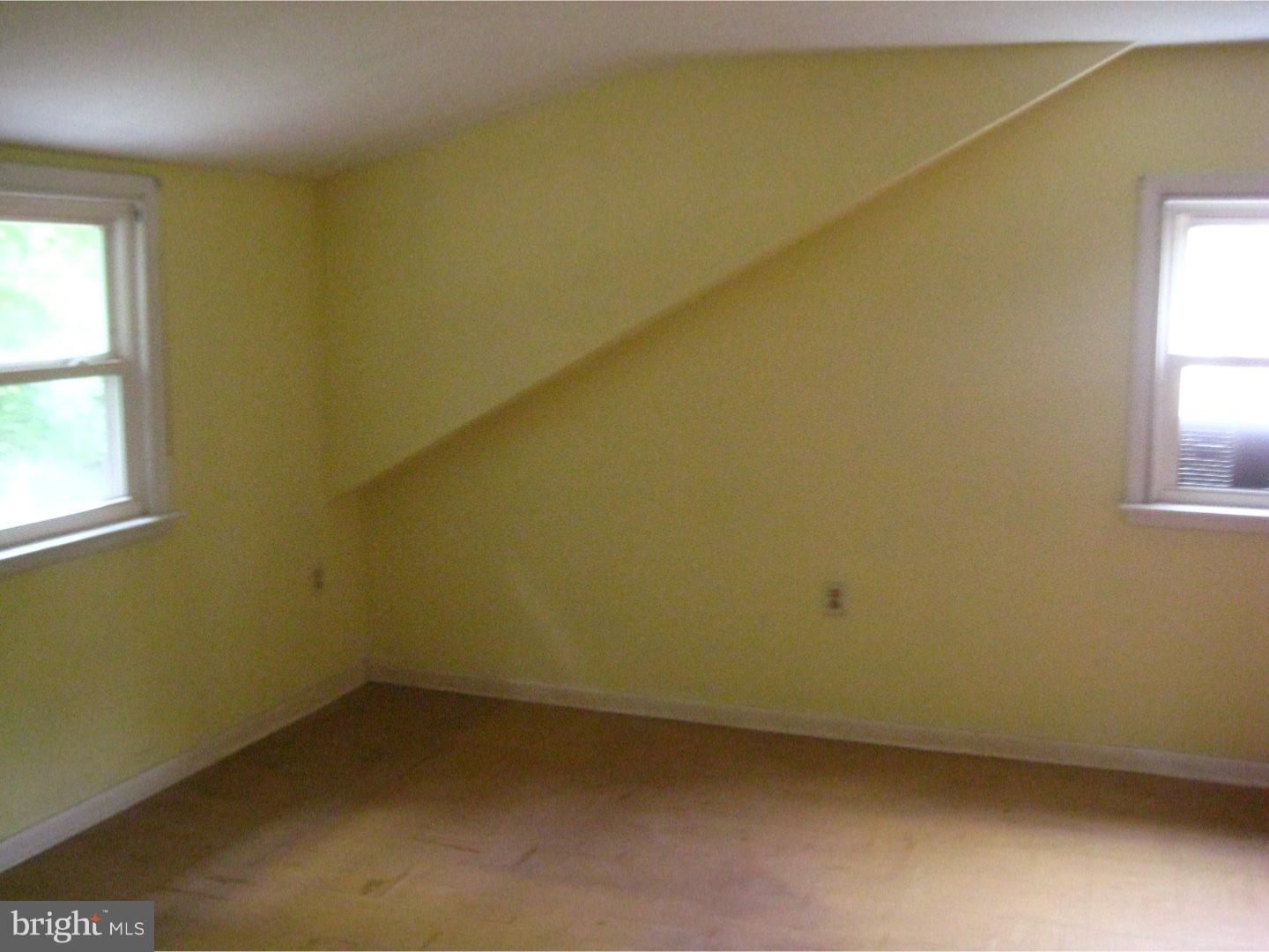 1074 Kipling Road Jenkintown, PA 19046 - Photo 17 of 18 an empty room with a window