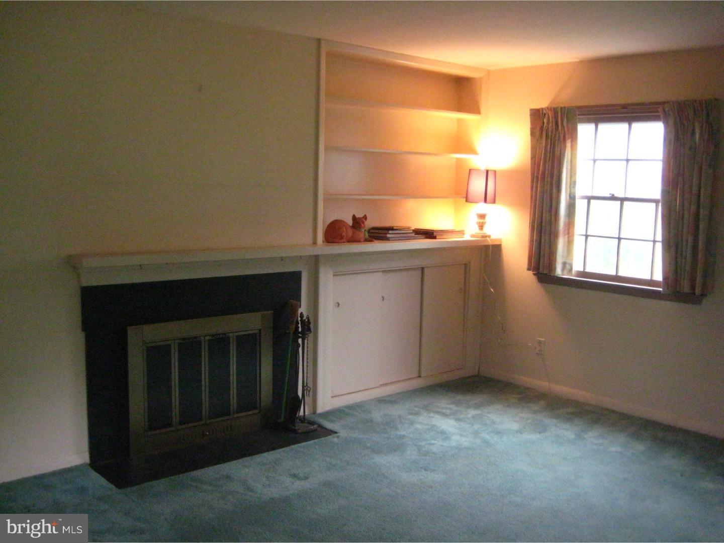 1074 Kipling Road Jenkintown, PA 19046 - Photo 4 of 18 a view of a room with window and fireplace