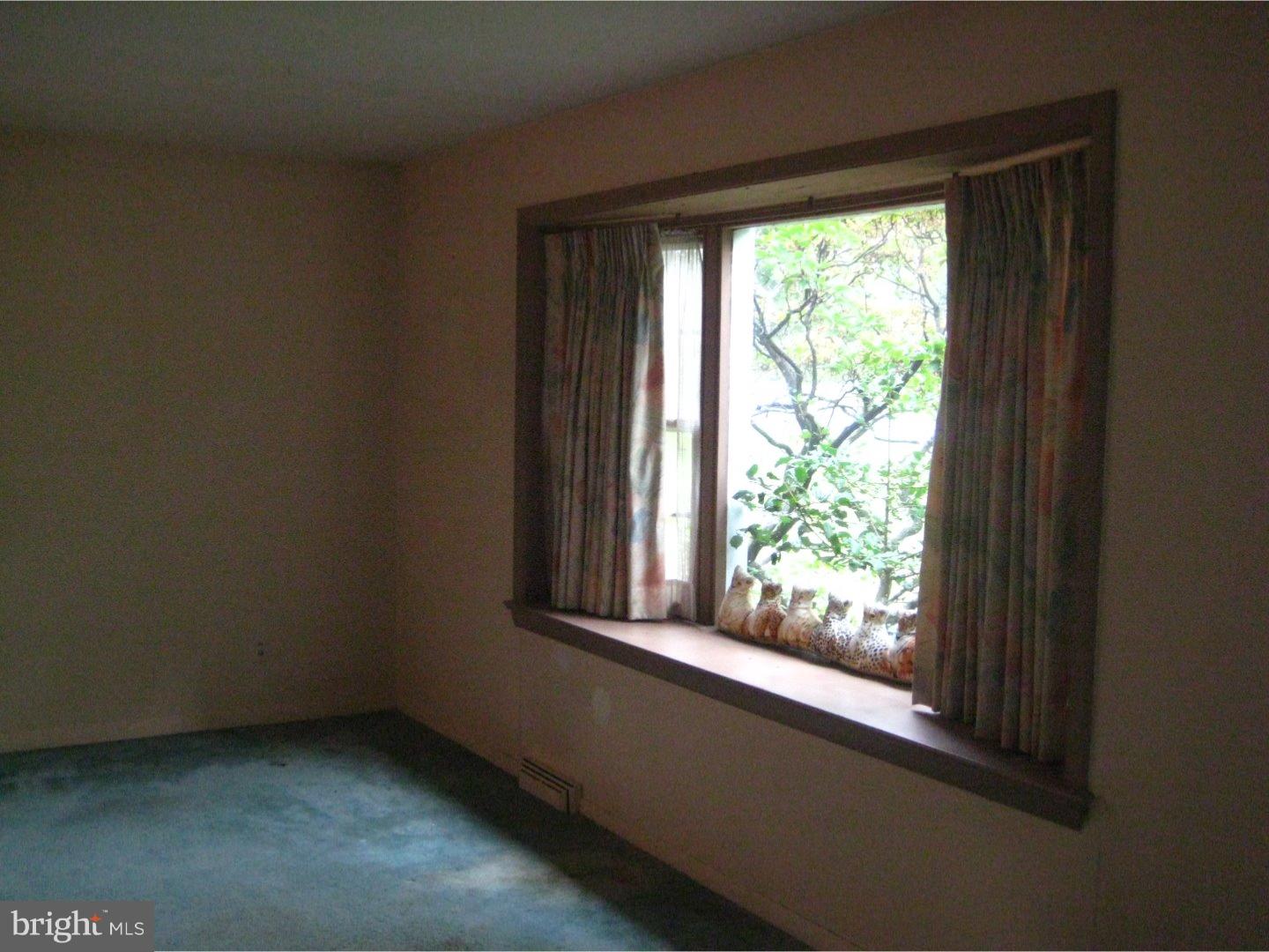 1074 Kipling Road Jenkintown, PA 19046 - Photo 7 of 18 a view of a window in an empty room