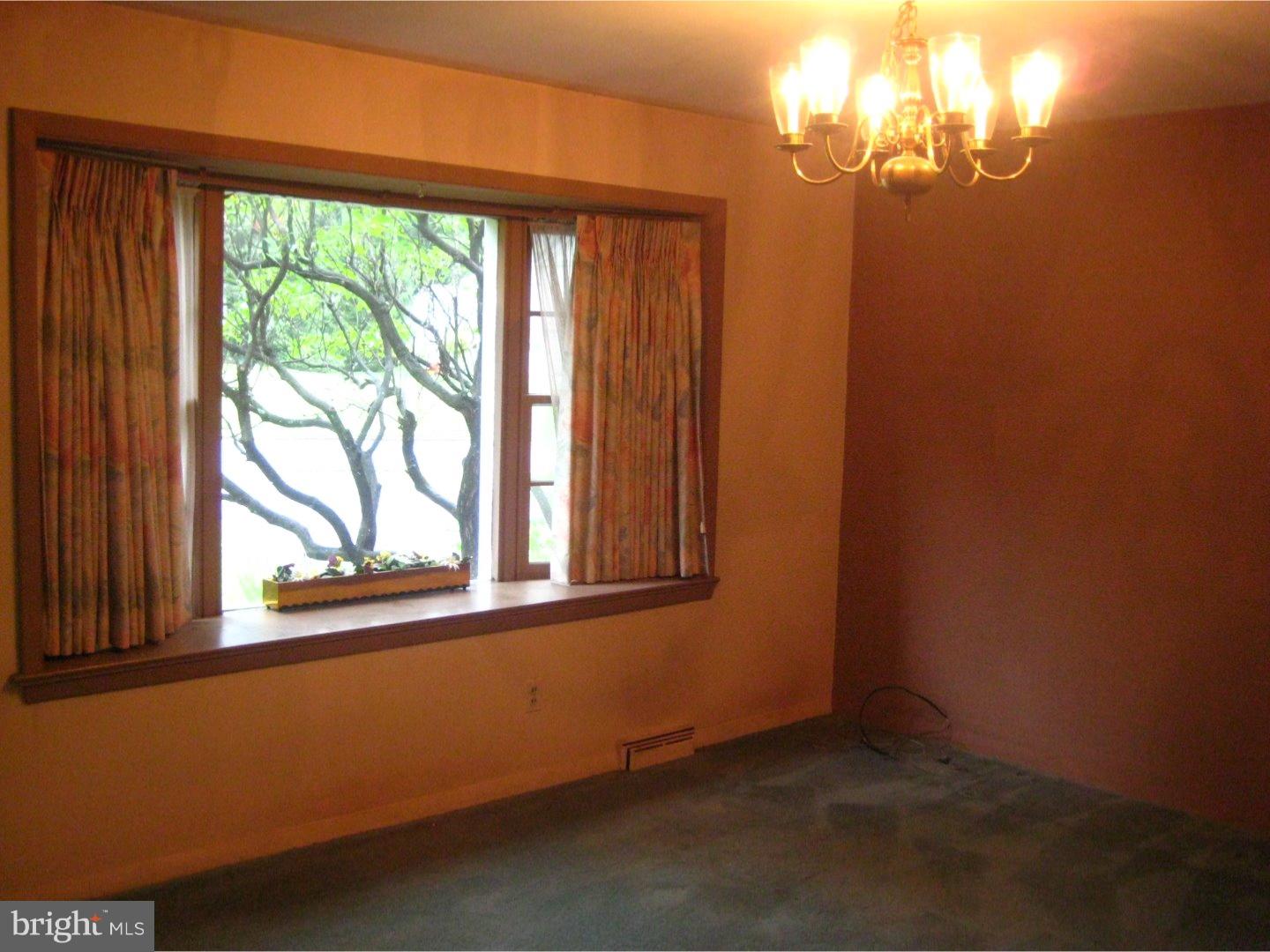 1074 Kipling Road Jenkintown, PA 19046 - Photo 10 of 18 a view of an empty room with a window