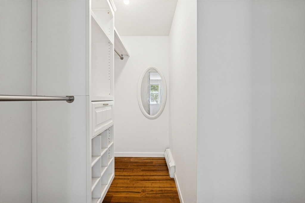 16 Captain Danforth Lane Amherst, NH 03031 - Photo 20 of 30 a view of a hallway with wooden floor