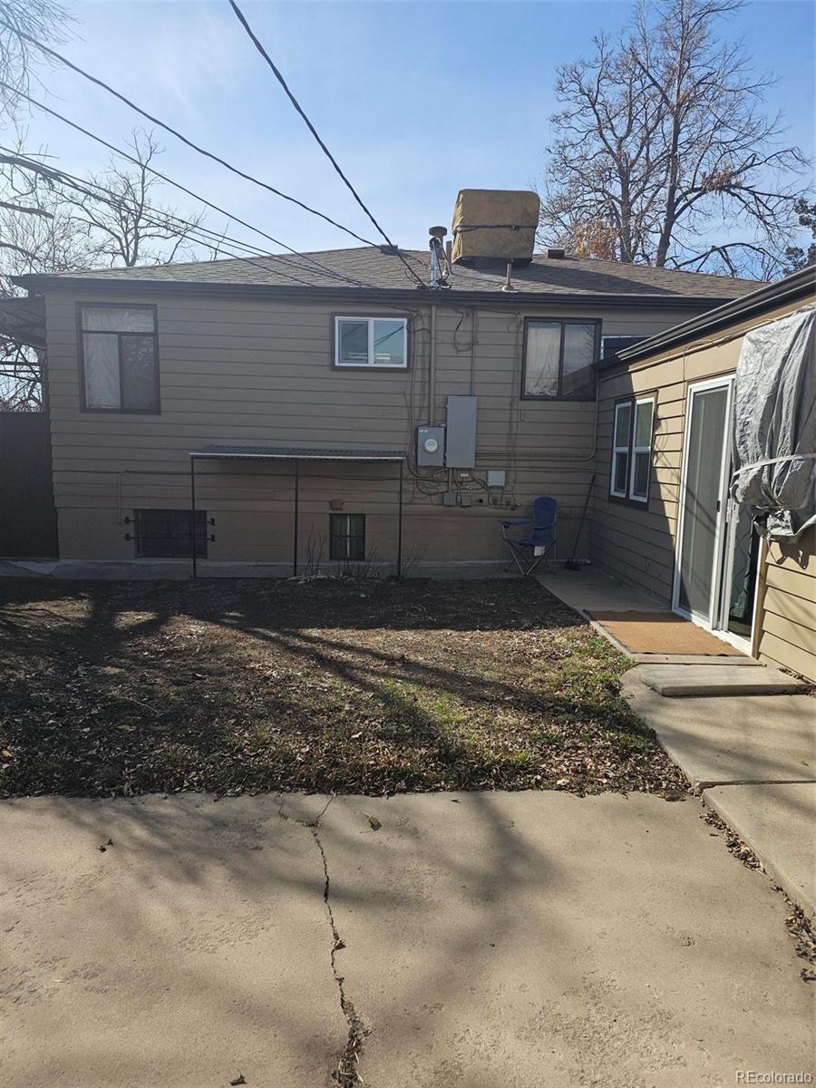1955 West Virginia Avenue Denver, CO 80223 - Photo 36 of 36 a view of a house with a yard