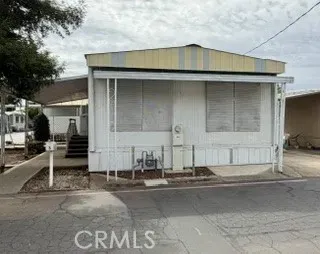 a front view of a house with garage