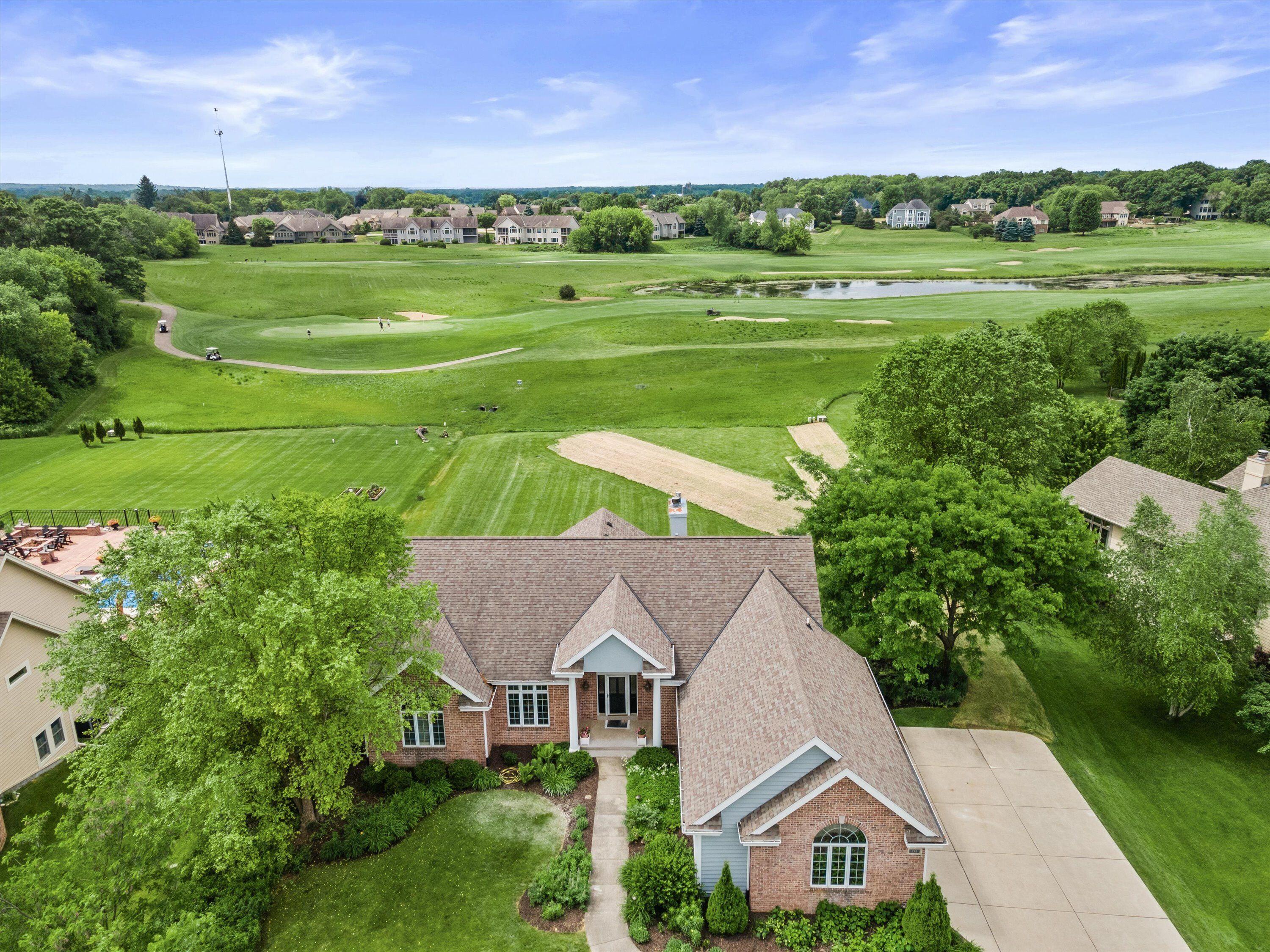 219 Muirfield Court North Prairie, WI 53153 - Photo 3 of 45 View from above the home facing south toward the 8th Green