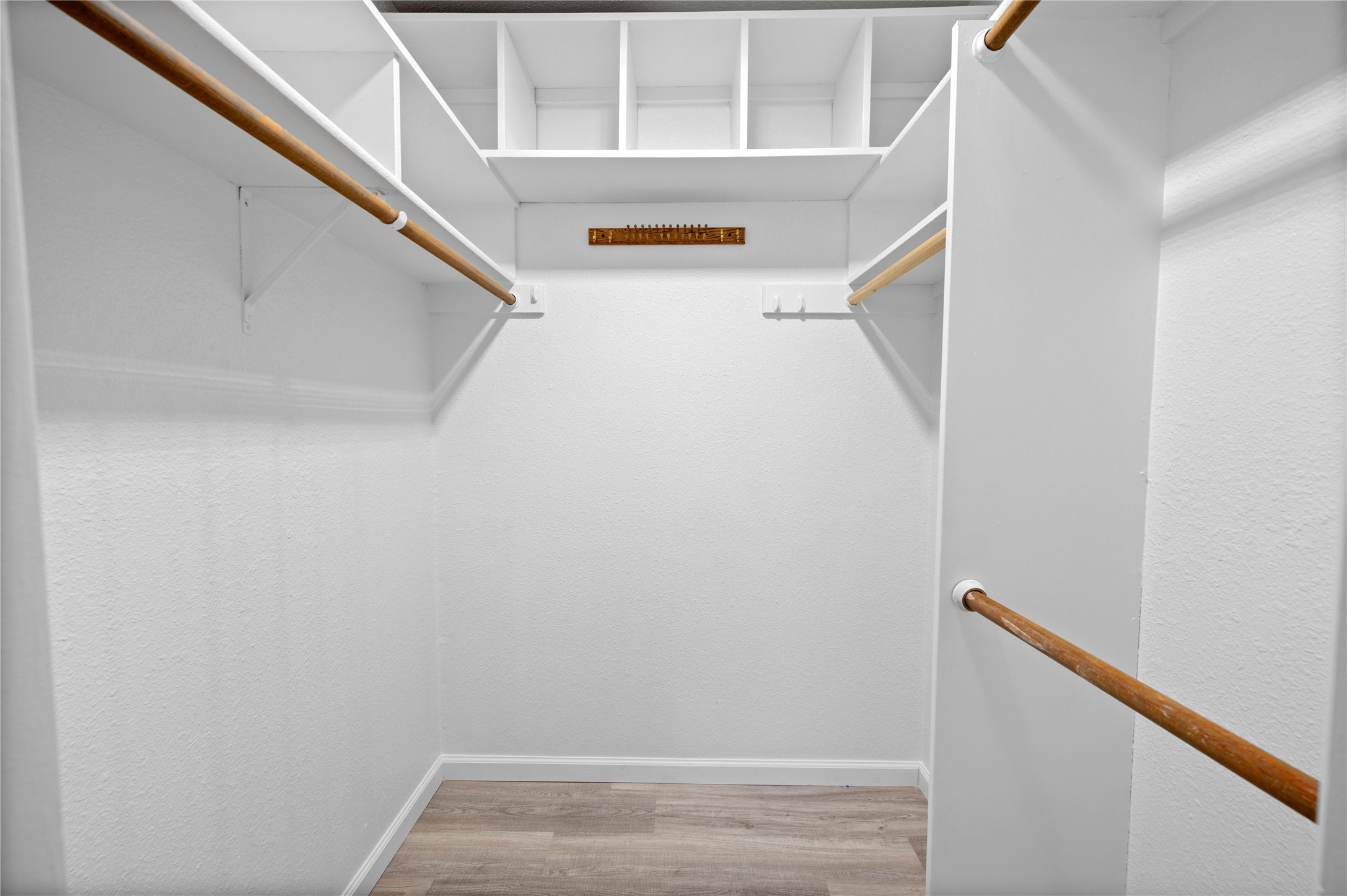 11301 Jollyville Road, Unit B3 Austin, TX 78759 - Photo 16 of 23 Walk in closet featuring light wood finished floors