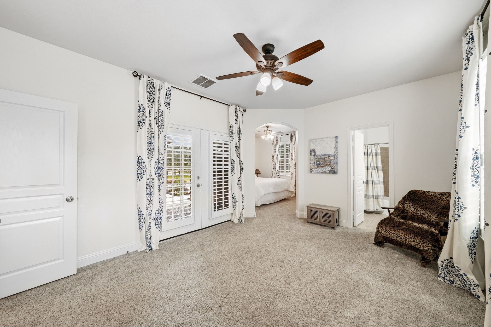 17610 Strackfield Lane Tomball, TX 77377 - Photo 30 of 50 Designed for both comfort and independence, the suite’s living room provides a cozy setting where guests can enjoy their own private sanctuary. This is also the perfect room for your mother-in-law or nanny.