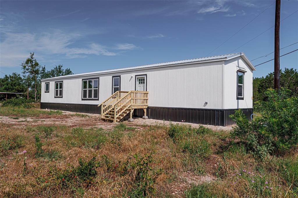 4510 Tennessee Trail Granbury, TX 76048 - Photo 4 of 25 a house view with a backyard space