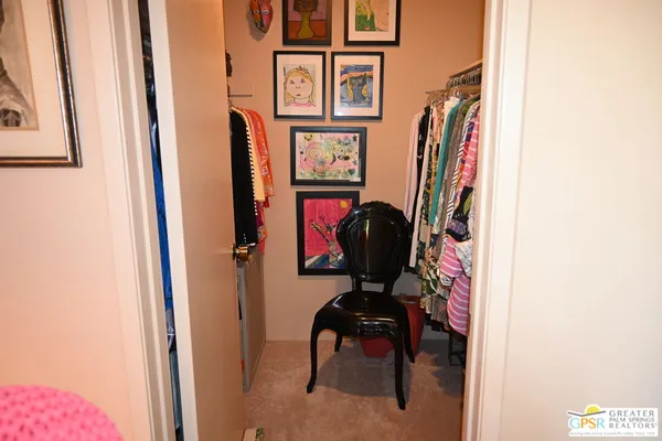 a bathroom with a sink vanity mirror and toilet