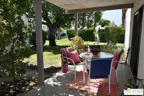 a outdoor space with chairs and couch
