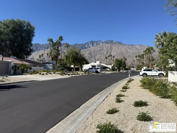 a view of a city with a yard
