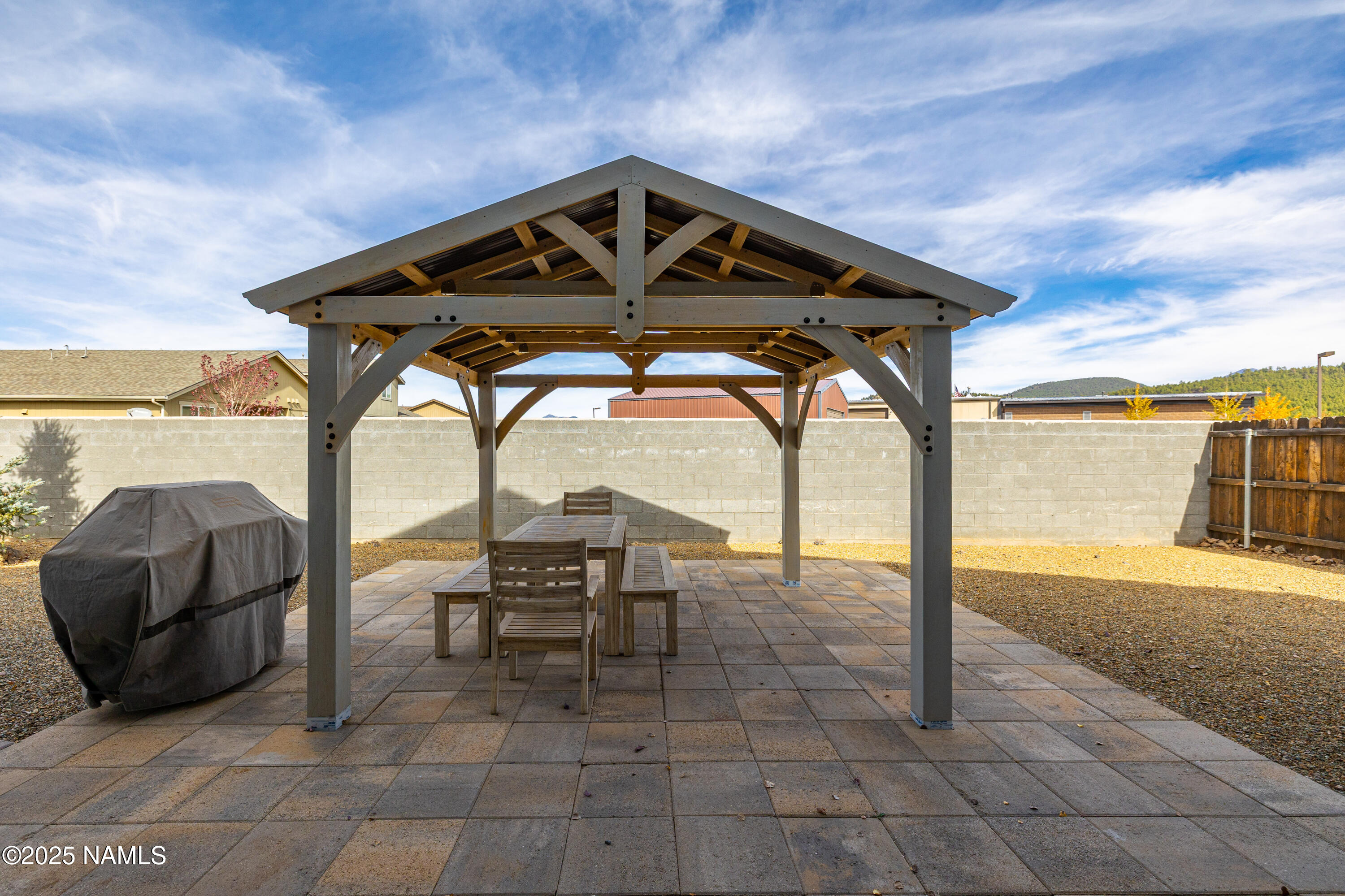 12030 Hydrus Road Bellemont, AZ 86015 - Photo 2 of 30 a front view of a house with garden