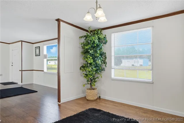 a kitchen with a refrigerator and a window