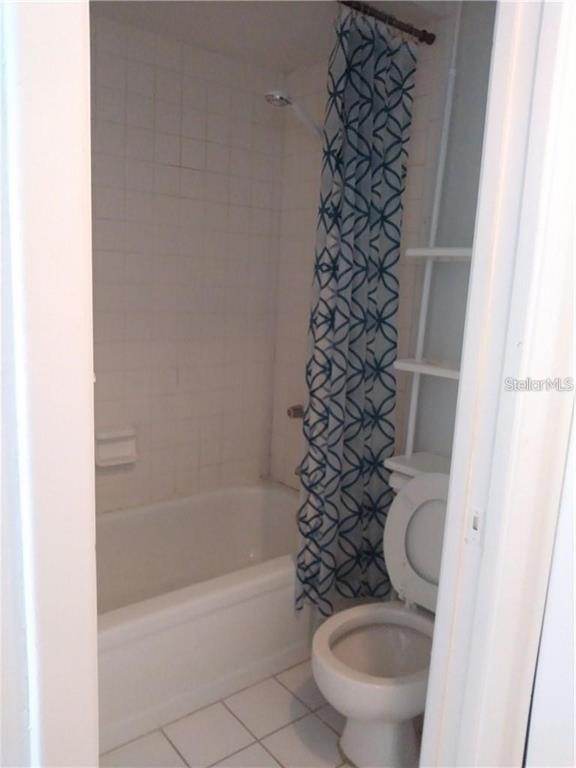 3640 Meriden Avenue Oldsmar, FL 34677 - Photo 4 of 6 a bathroom with a toilet and a shower