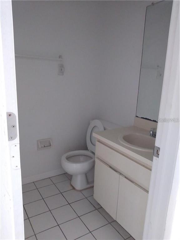 3640 Meriden Avenue Oldsmar, FL 34677 - Photo 6 of 6 a white toilet sitting next to a shower