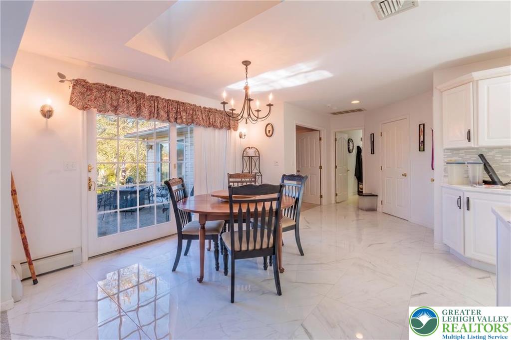 1089 Deemer Road Bath, PA 18014 - Photo 18 of 57 a view of a dining room with furniture and window
