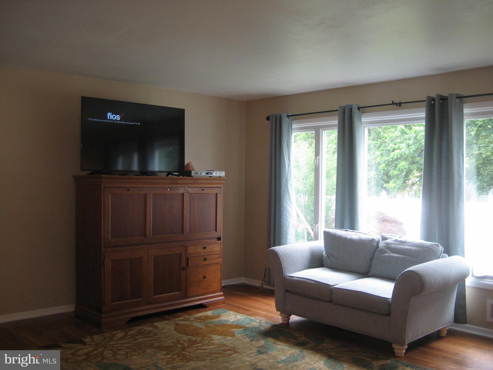 28 Beaumont Road Hamilton, NJ 08620 - Photo 9 of 26 Large window arrangement views backyard.