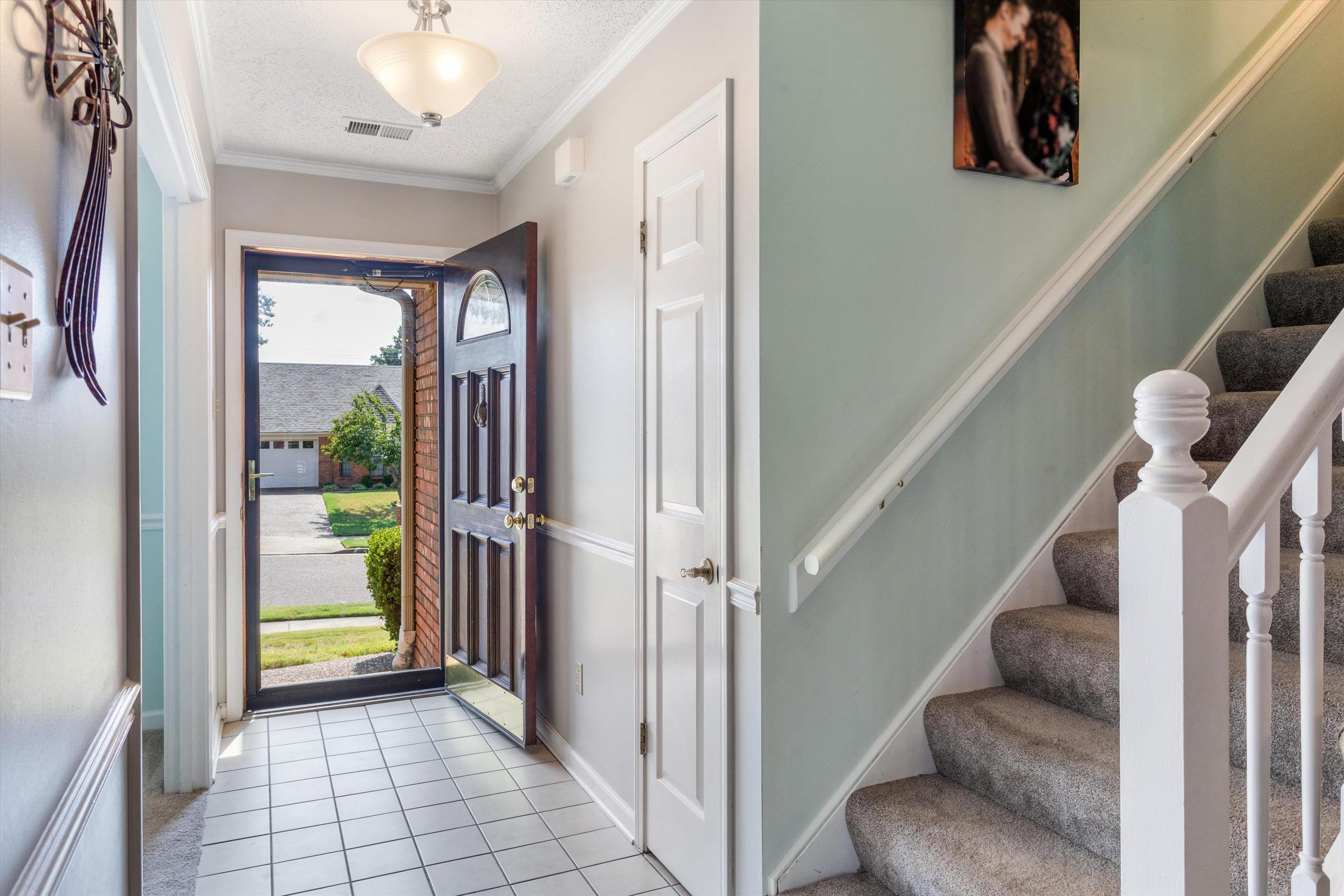 6614 Stephan Ridge Cove Bartlett, TN 38135 - Photo 16 of 26 a view of a hallway with wooden floor and entryway