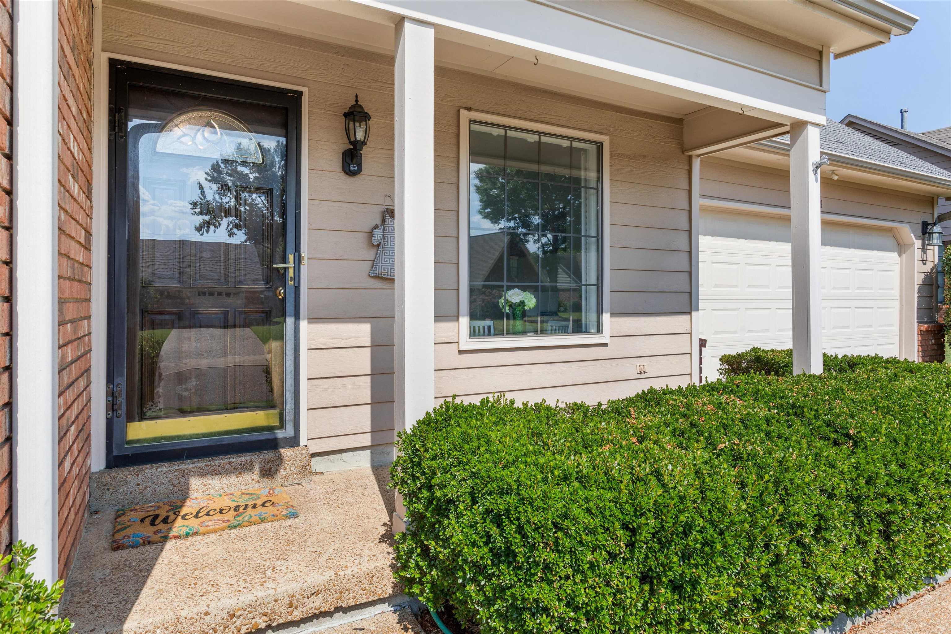 6614 Stephan Ridge Cove Bartlett, TN 38135 - Photo 26 of 26 a view of a entrance door of the house