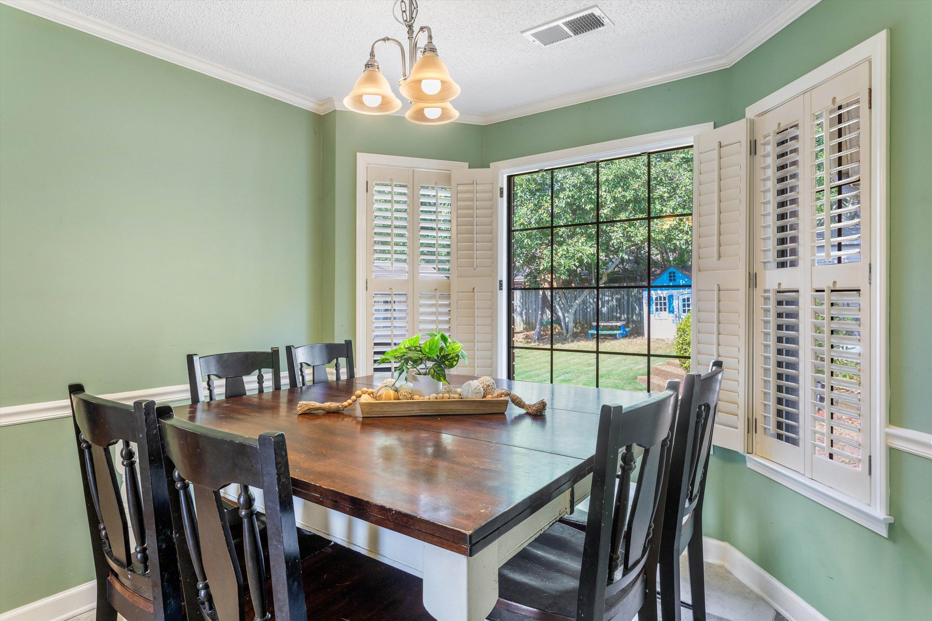 6614 Stephan Ridge Cove Bartlett, TN 38135 - Photo 8 of 26 a view of a dining room with furniture window and outside view