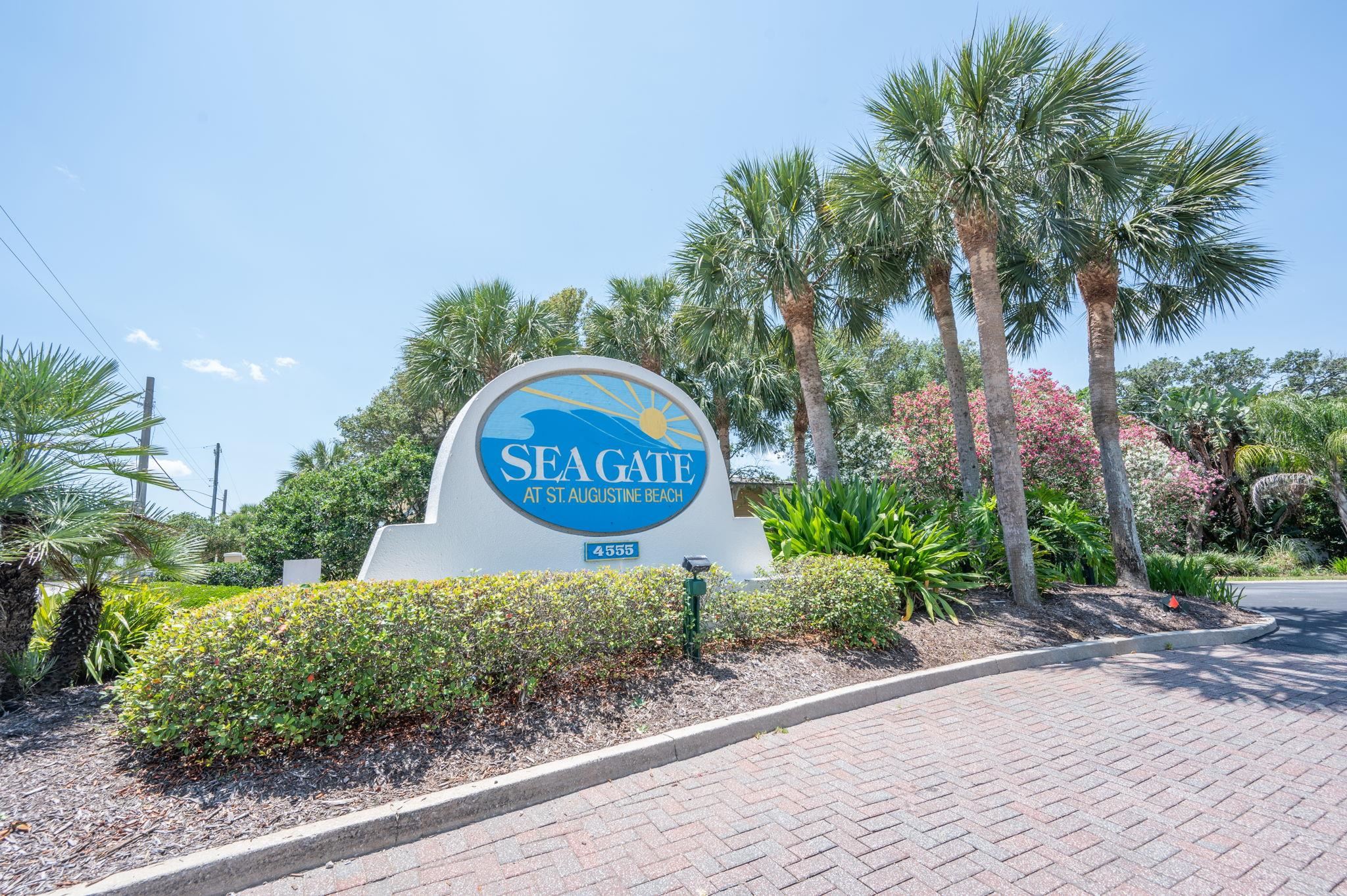 322 Monika Place St. Augustine, FL 32080 - Photo 2 of 55 a sign board with a street sign and a small yard