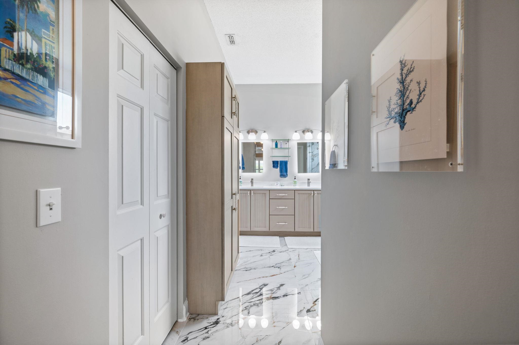 322 Monika Place St. Augustine, FL 32080 - Photo 22 of 55 a view of a bathroom with a sink and mirror